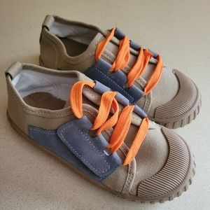 Brand new! Canvas shoes. Size 13. Tan, blue and orange.